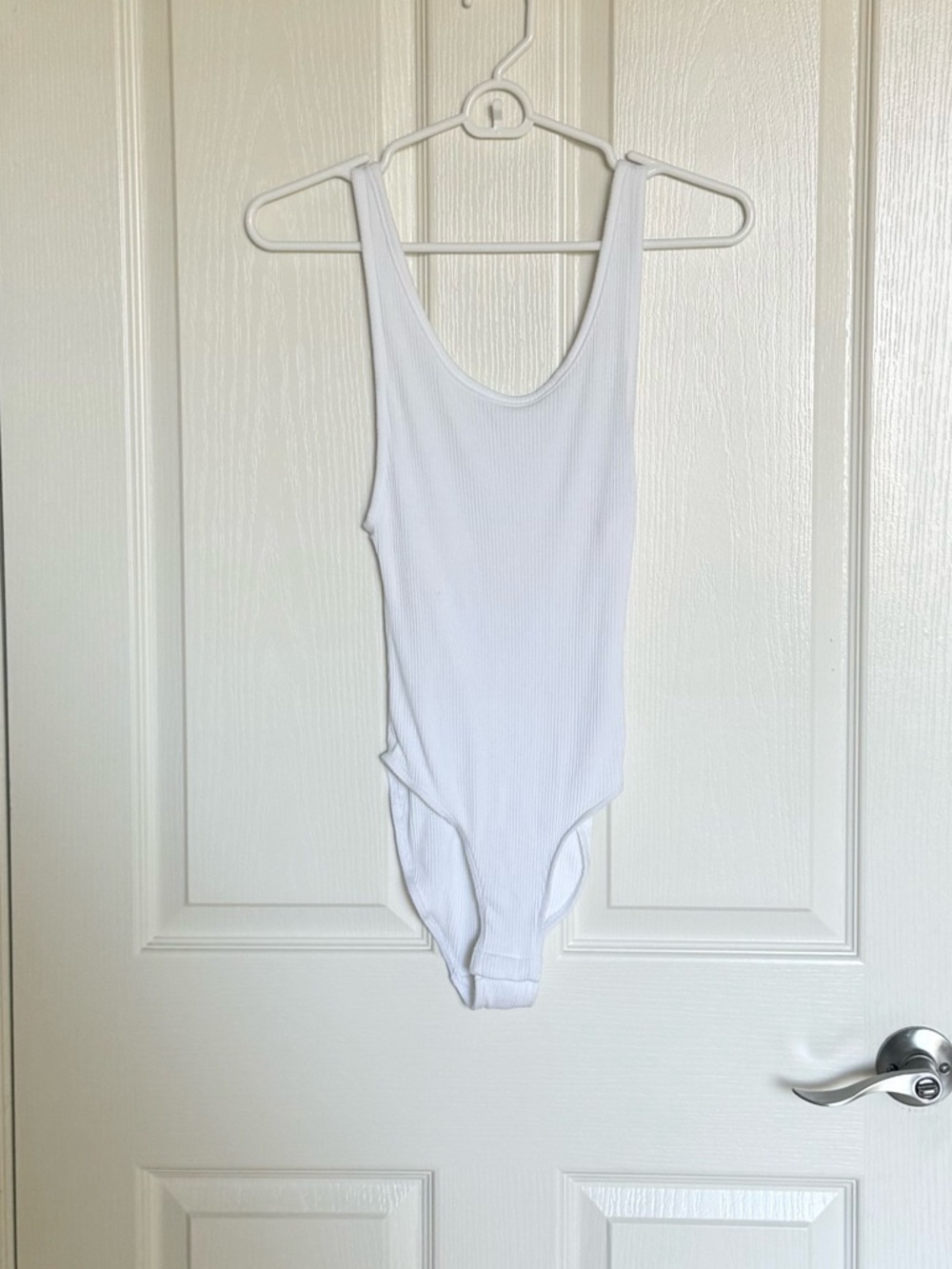 Urban Outfitters: White Ribbed One-Piece bodysuit - Size XS